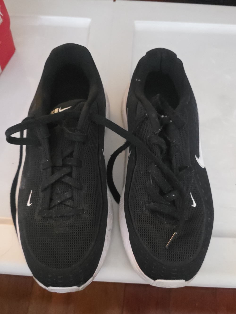Nike Men’s Black Athletic Running Shoes with White Swoosh